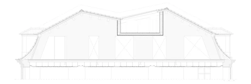Section drawing showing a curved roof structure with a central skylight and supporting columns below