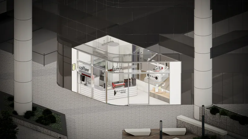 Aerial view showing the glass-walled kiosk with exposed interior counter and seating area