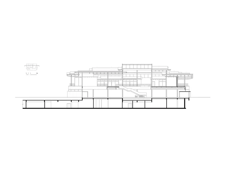 Section drawing showing the layered roof planes cantilevering over open terraces and ground-level spaces