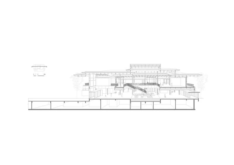 Section drawing featuring a diagonal staircase connecting multiple levels beneath the overhanging roof assembly