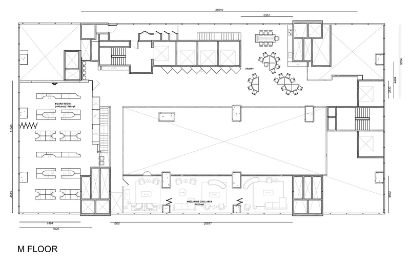 Mezzanine floor plan drawing showing a double-height void space with balconies and smaller meeting areas