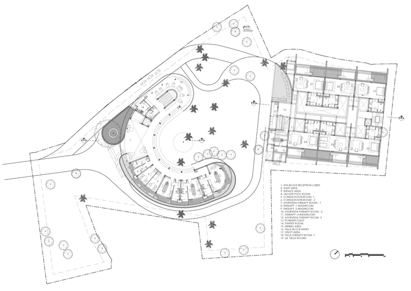 First floor plan showing a curved wing with interior rooms and a rectangular block with subdivided spaces