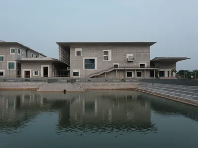 Three Studios from Tokyo and Hyderabad Build a Convention Center of Curved Concrete and Courtyards