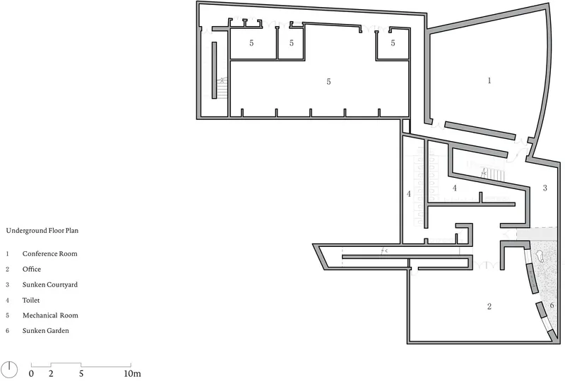 Underground floor plan drawing revealing sunken courtyards, conference room, and mechanical spaces below grade