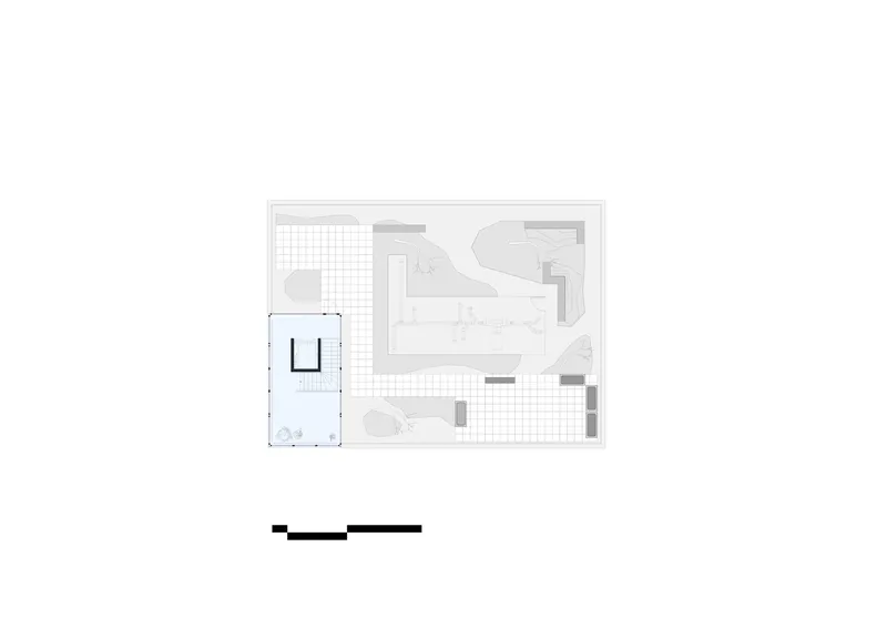 Floor plan drawing showing ground level with gridded exterior spaces and interior volumes