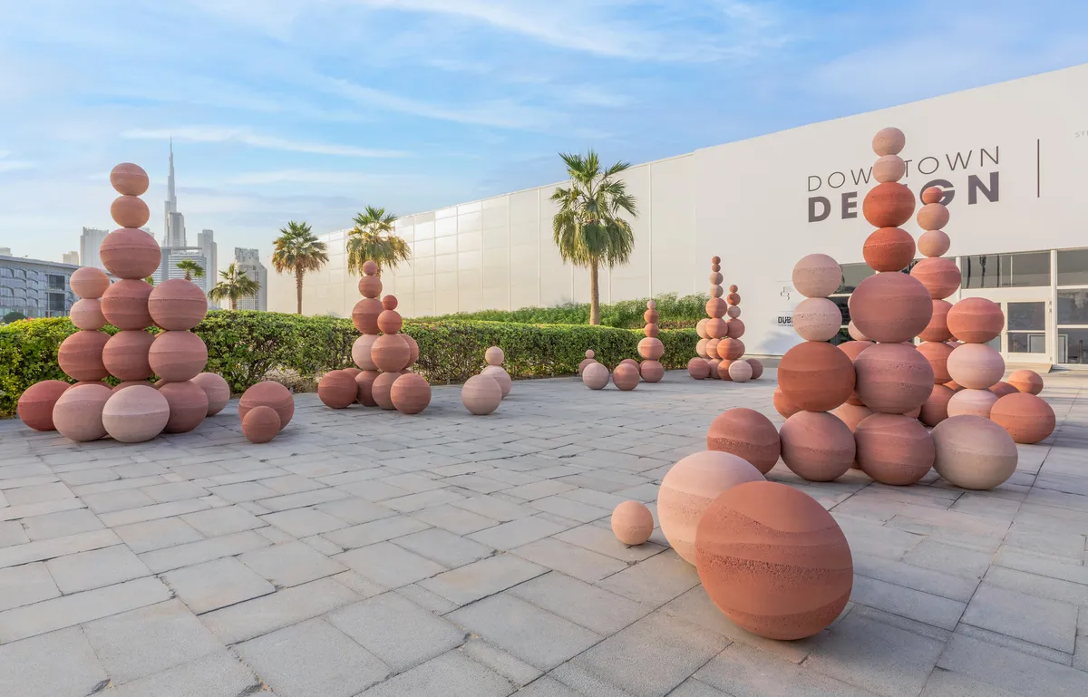 Karim + Elias Stack 150 Rammed-Earth Spheres into an Open-Air Landscape for Dubai Design