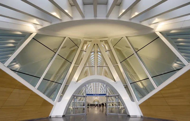 View through the glazed dome structure showing structural ribs converging toward the center
