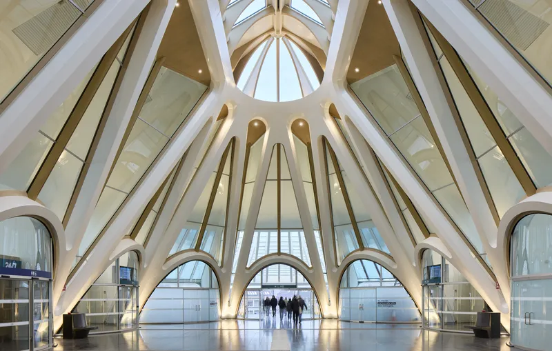 Interior view of the arched structural ribs framing the circular skylight and terminal openings