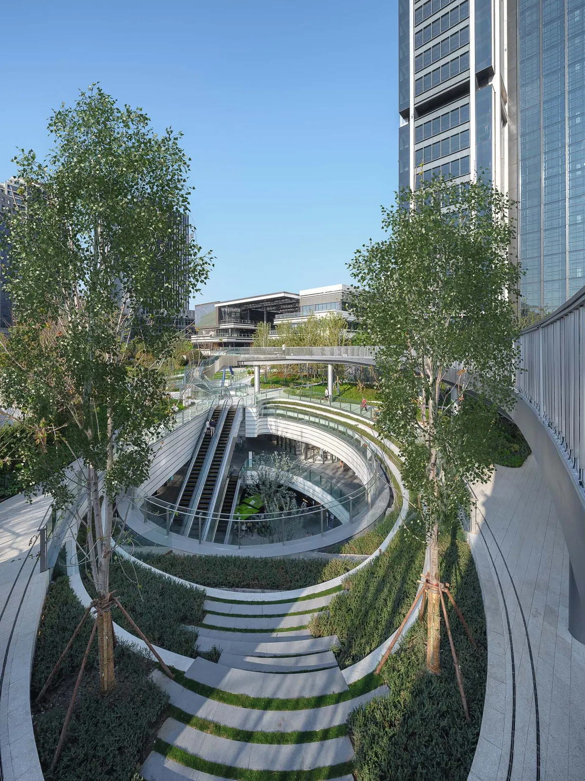 Kokaistudios Buries a Mall Beneath 42,000 Square Meters of Urban Parkland on Shanghai's Suzhou Creek