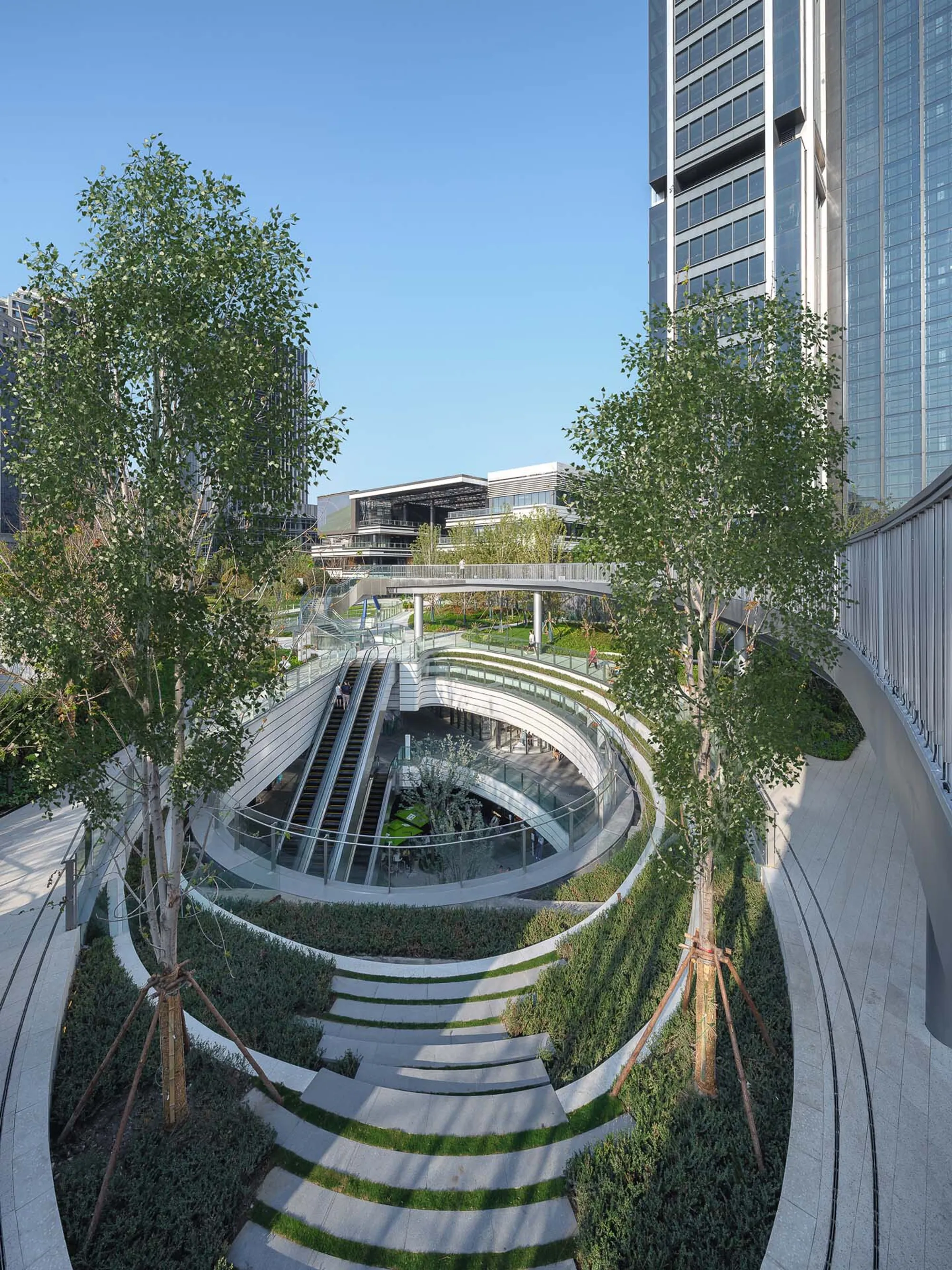 Kokaistudios Buries a Mall Beneath 42,000 Square Meters of Urban Parkland on Shanghai's Suzhou Creek