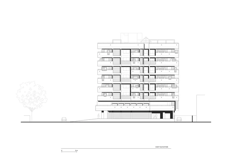 East elevation drawing of a multi-story residential building with a single tree at ground level