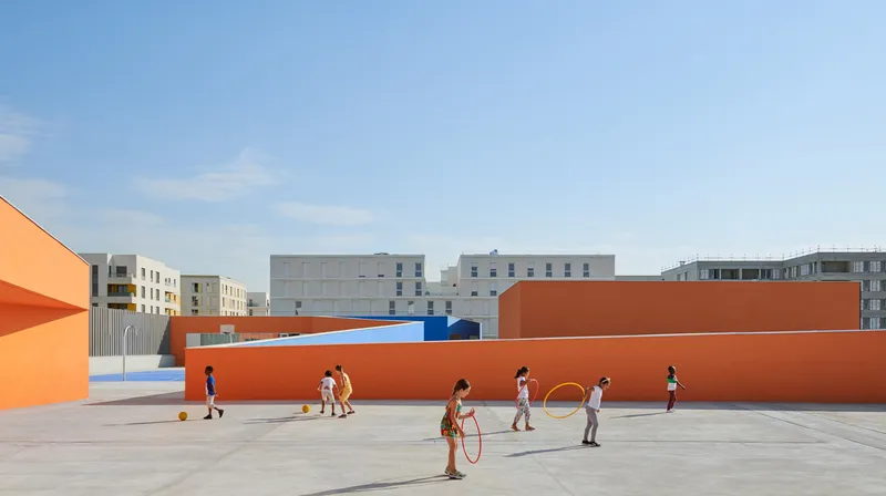 Children playing on the rooftop courtyard enclosed by tall orange walls and blue surfaces