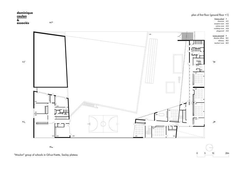 First floor plan drawing showing a sports court flanked by classrooms and stairwells