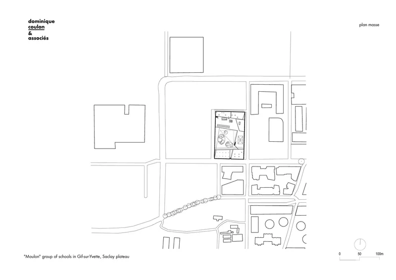 Site plan drawing showing the school complex within the surrounding urban blocks and curved roadways