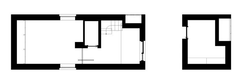 Floor plan drawing showing rectangular rooms with staircase and small adjacent volume