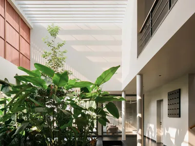 i2a Architects Studio Weaves a Louvered Kerala Home Through a Former Nutmeg Plantation