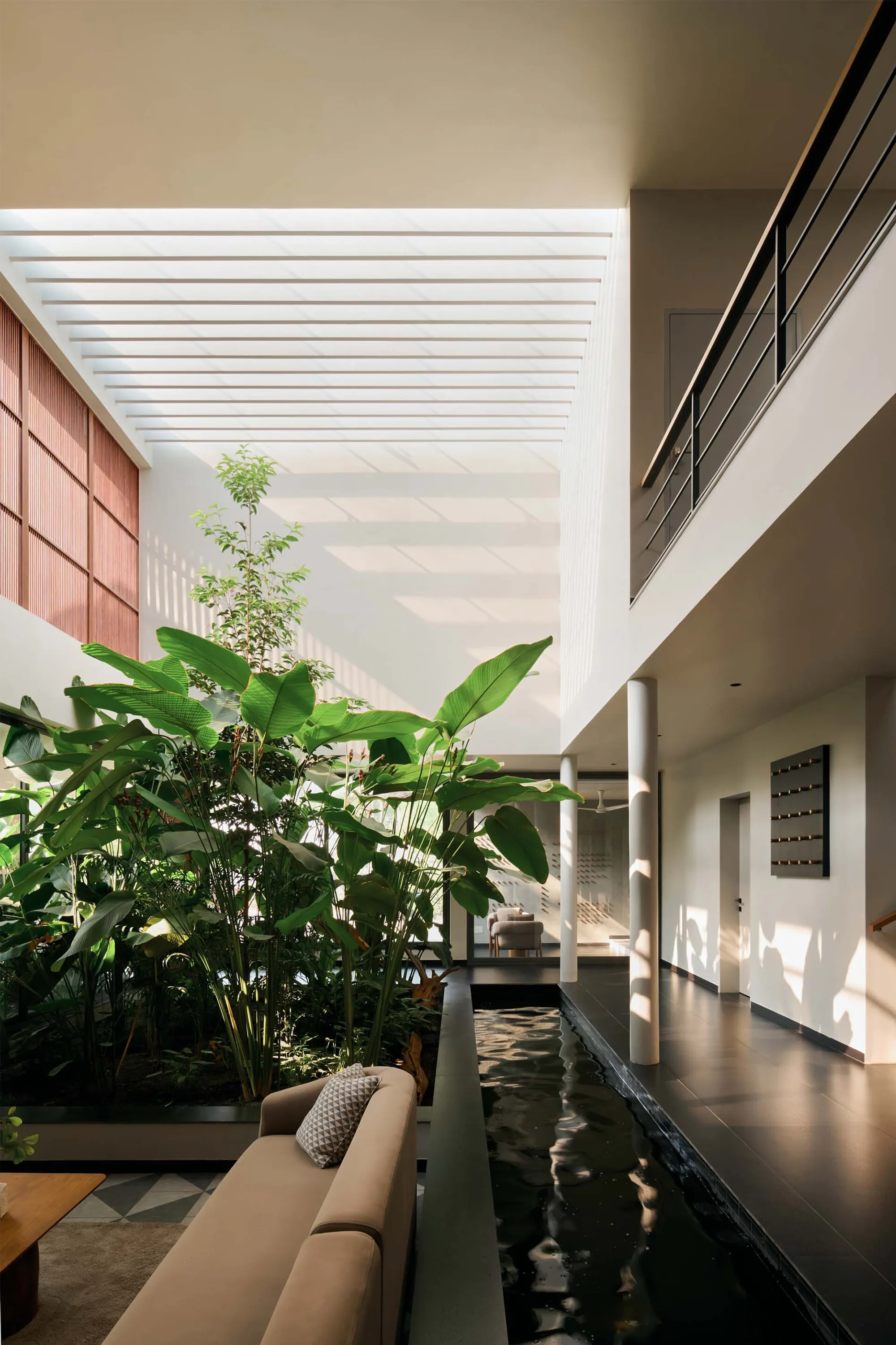 i2a Architects Studio Weaves a Louvered Kerala Home Through a Former Nutmeg Plantation