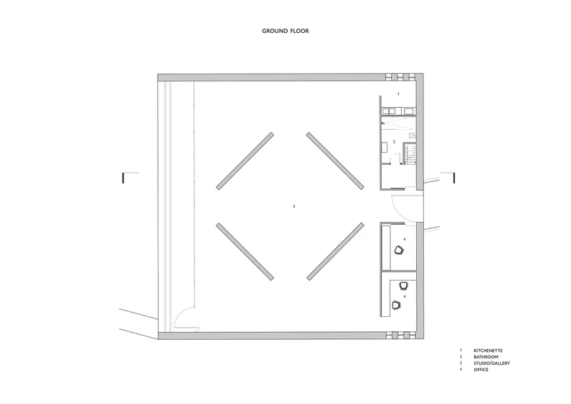 Ground floor plan with central diamond arrangement of slanted elements and service spaces to one side