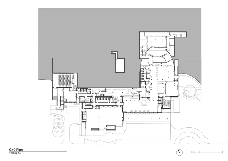 Ground floor plan drawing revealing detailed interior layout with auditorium and support spaces