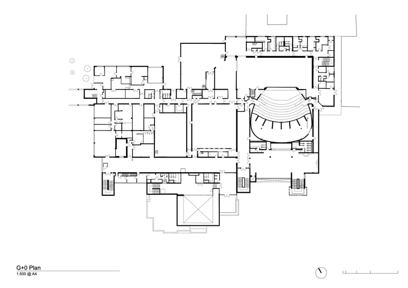 Ground floor plan drawing displaying wings radiating from central halls with curved auditorium
