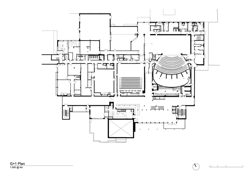 First floor plan drawing showing upper level with terraced seating in rounded theater volume
