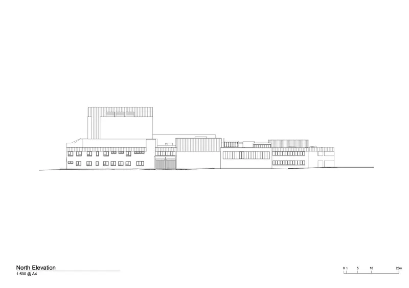 North elevation drawing showing a linear facade with repetitive window openings and a tower element