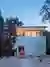 Bercy Fadel Weaves a White Brick House Through the Oaks of Austin's Bouldin Creek