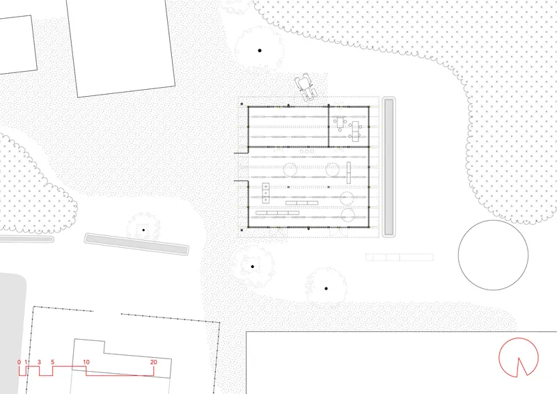 Site plan drawing showing the building footprint with surrounding landscape and adjacent structures