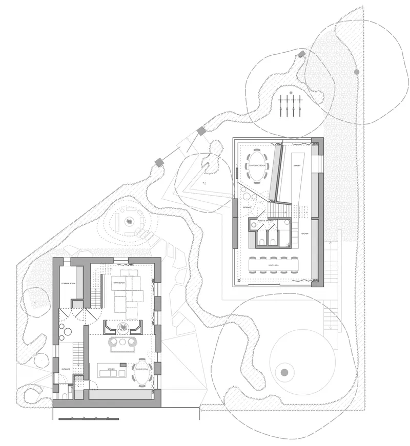 Ground floor plan showing two structures within a landscaped site with topographic contours