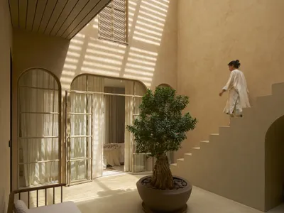 Studio VDGA Wraps a Pune Courtyard House in Layered Jali Screens That Breathe with Light