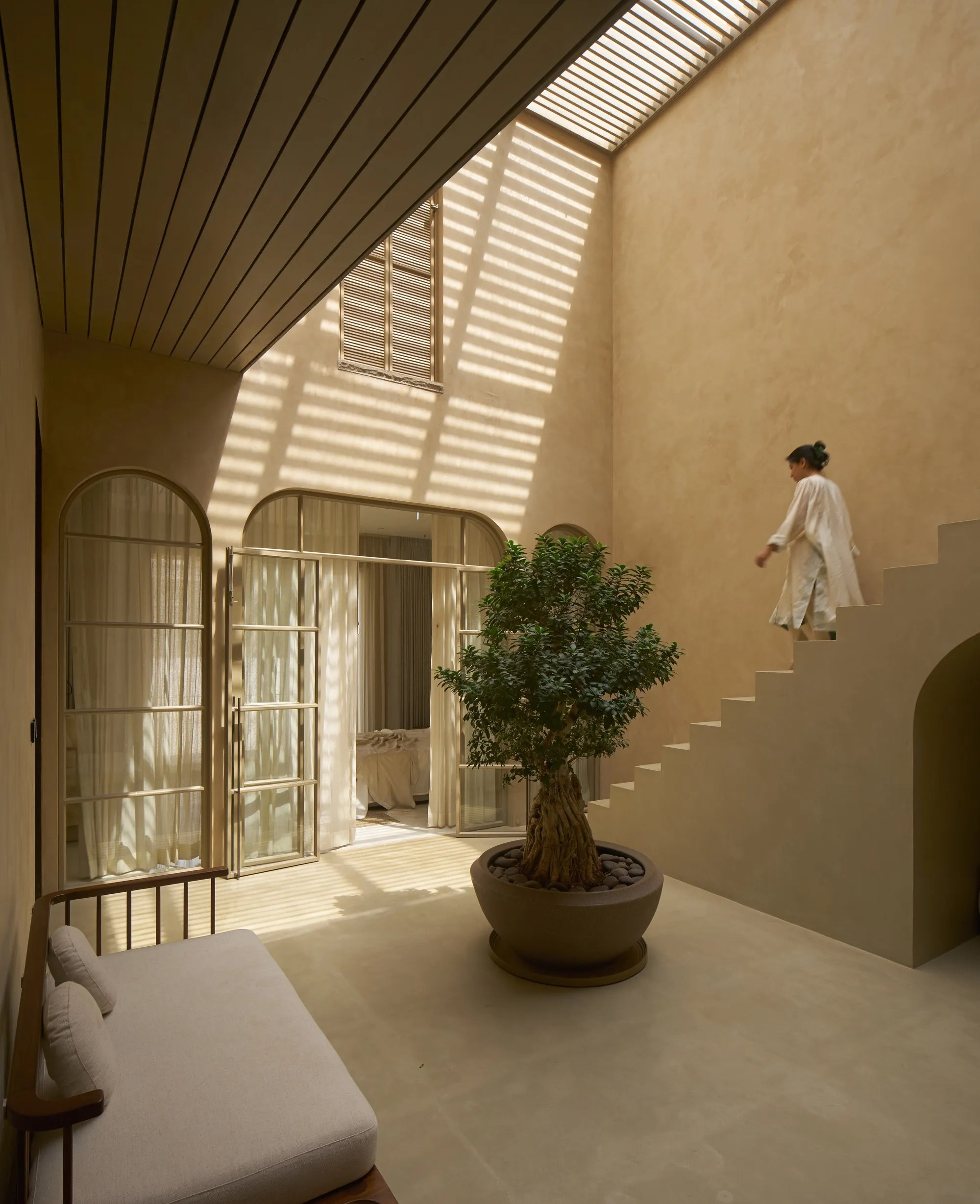 Studio VDGA Wraps a Pune Courtyard House in Layered Jali Screens That Breathe with Light