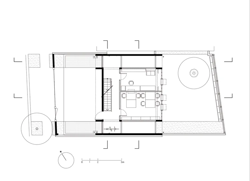 First floor plan showing open living and dining area with exterior terrace and circular pool