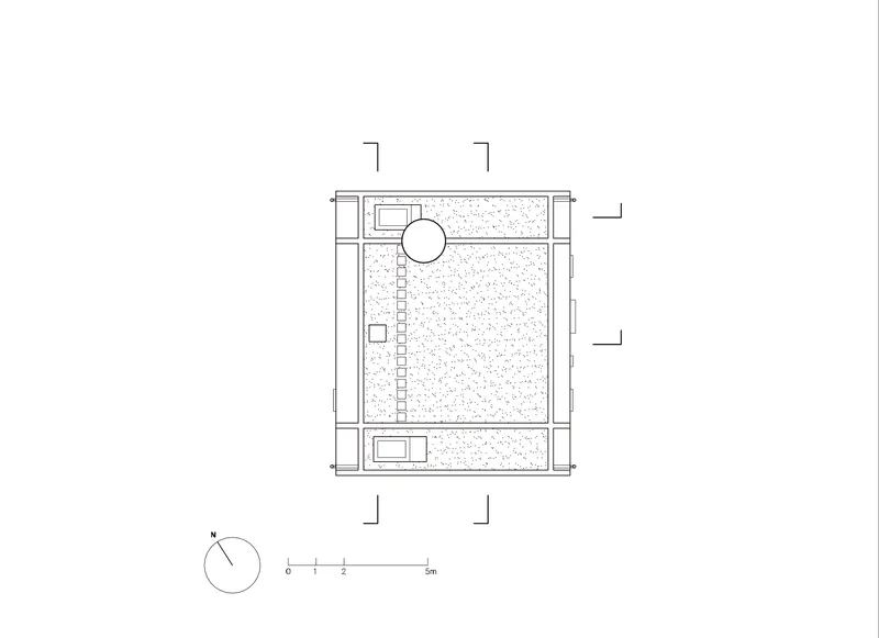 Roof plan showing central courtyard with circular element and textured surface treatment