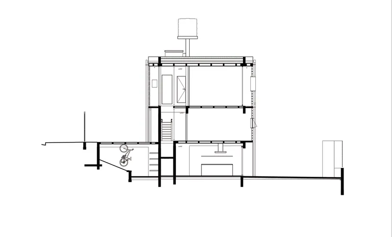 Section drawing showing living spaces across three levels with central stair and rooftop water tank