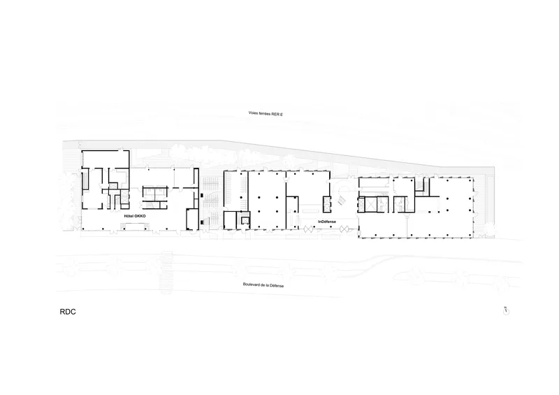 Ground floor plan drawing of an elongated bar building with open spaces and cellular rooms