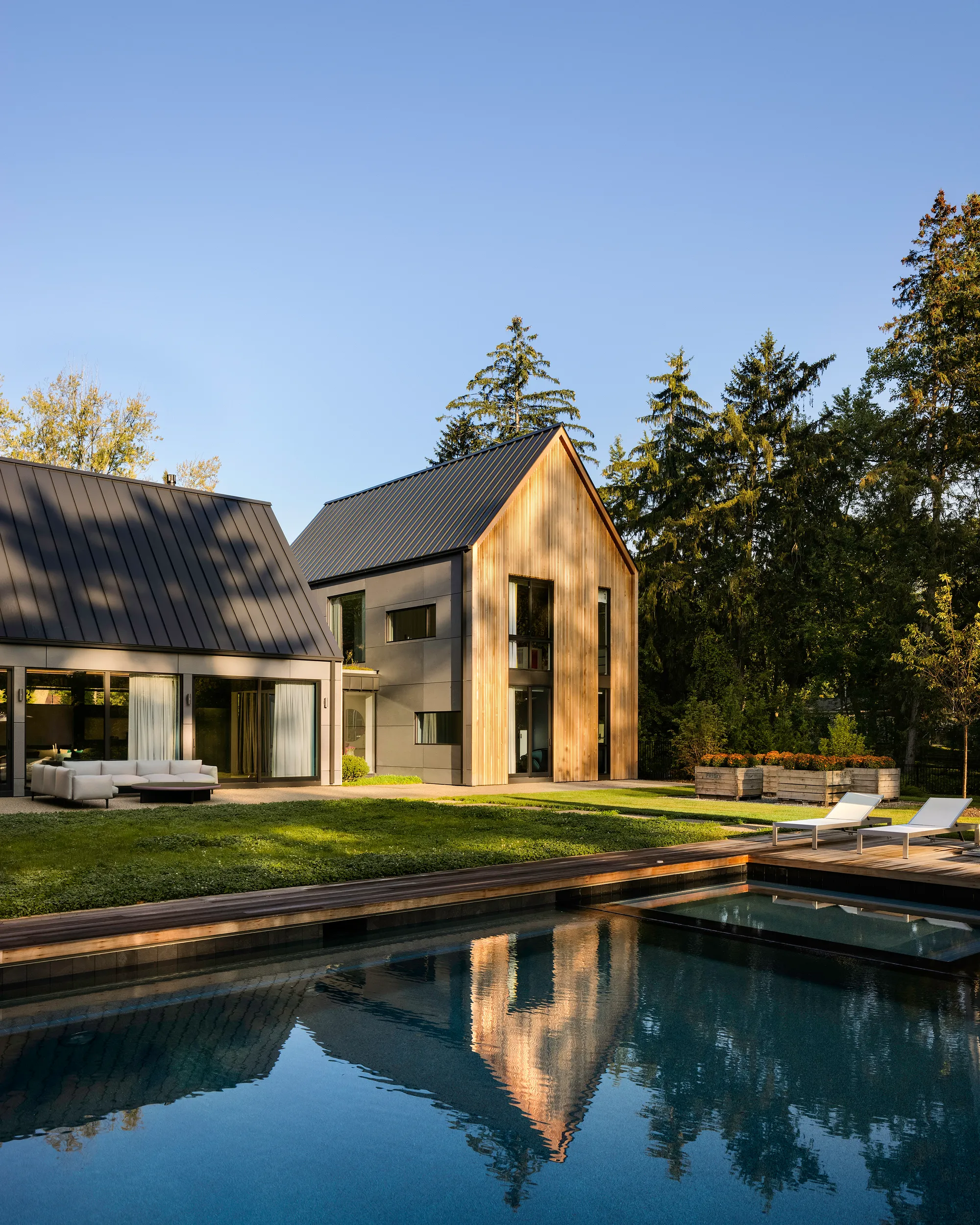 Disbrow Iannuzzi Scatters Four Gabled Pavilions Across a Michigan Farmstead