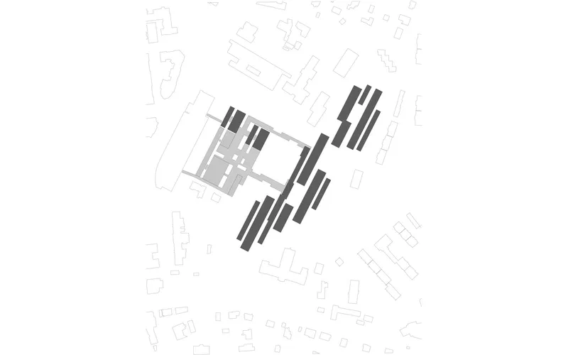 Figure-ground plan drawing highlighting building masses in black against the surrounding urban context