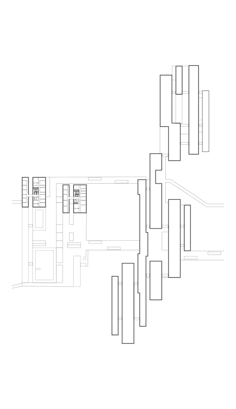 Site plan drawing showing building volumes arranged in a diagonal composition across the site