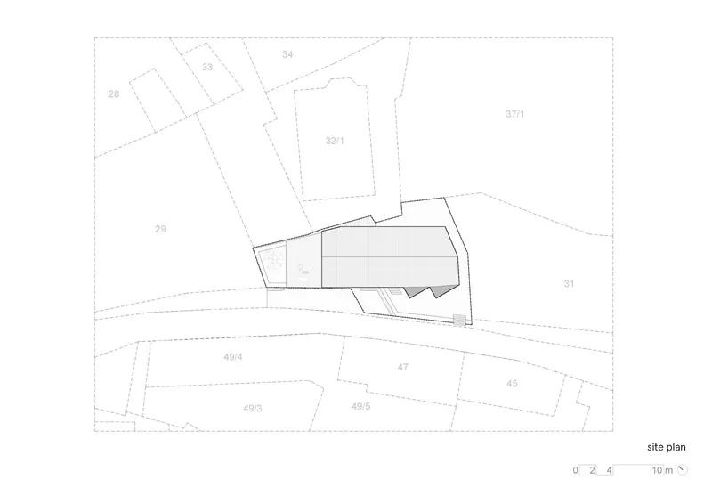 Site plan drawing showing the angled footprint within the surrounding parcels