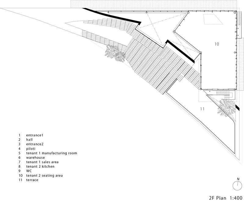 Floor plan drawing showing angular volumes with warehouse, tenant spaces, and terrace areas