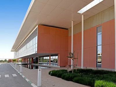AWM Architectes Urbanistes Wraps a Moroccan Data Center in Gabion, Terracotta, and a Double Roof