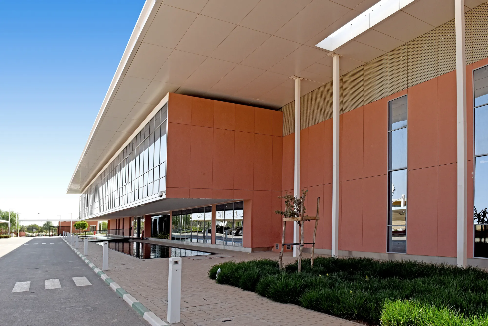 AWM Architectes Urbanistes Wraps a Moroccan Data Center in Gabion, Terracotta, and a Double Roof