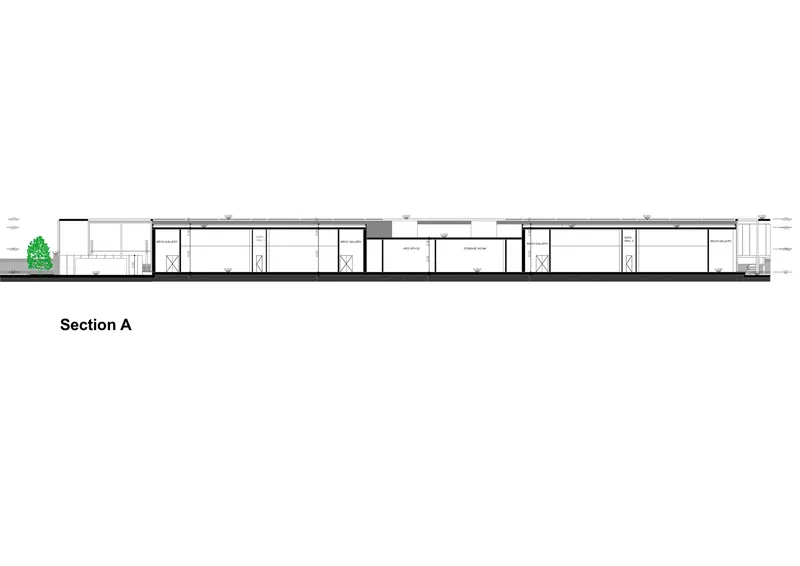 Section drawing showing interior room heights and roof line with a tree at left