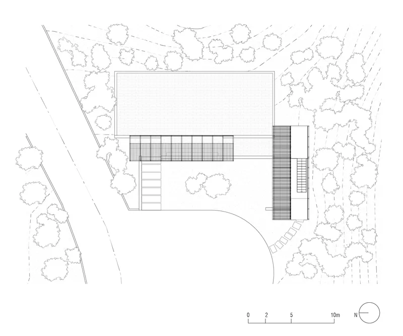 Floor plan drawing showing upper level with slatted screening and two stair cores