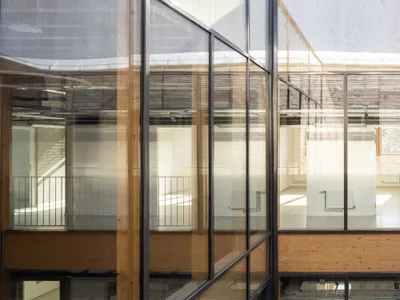 Atelier Téqui Architects Builds a Frugal Timber Research Center on a Former Livestock Market in Arras