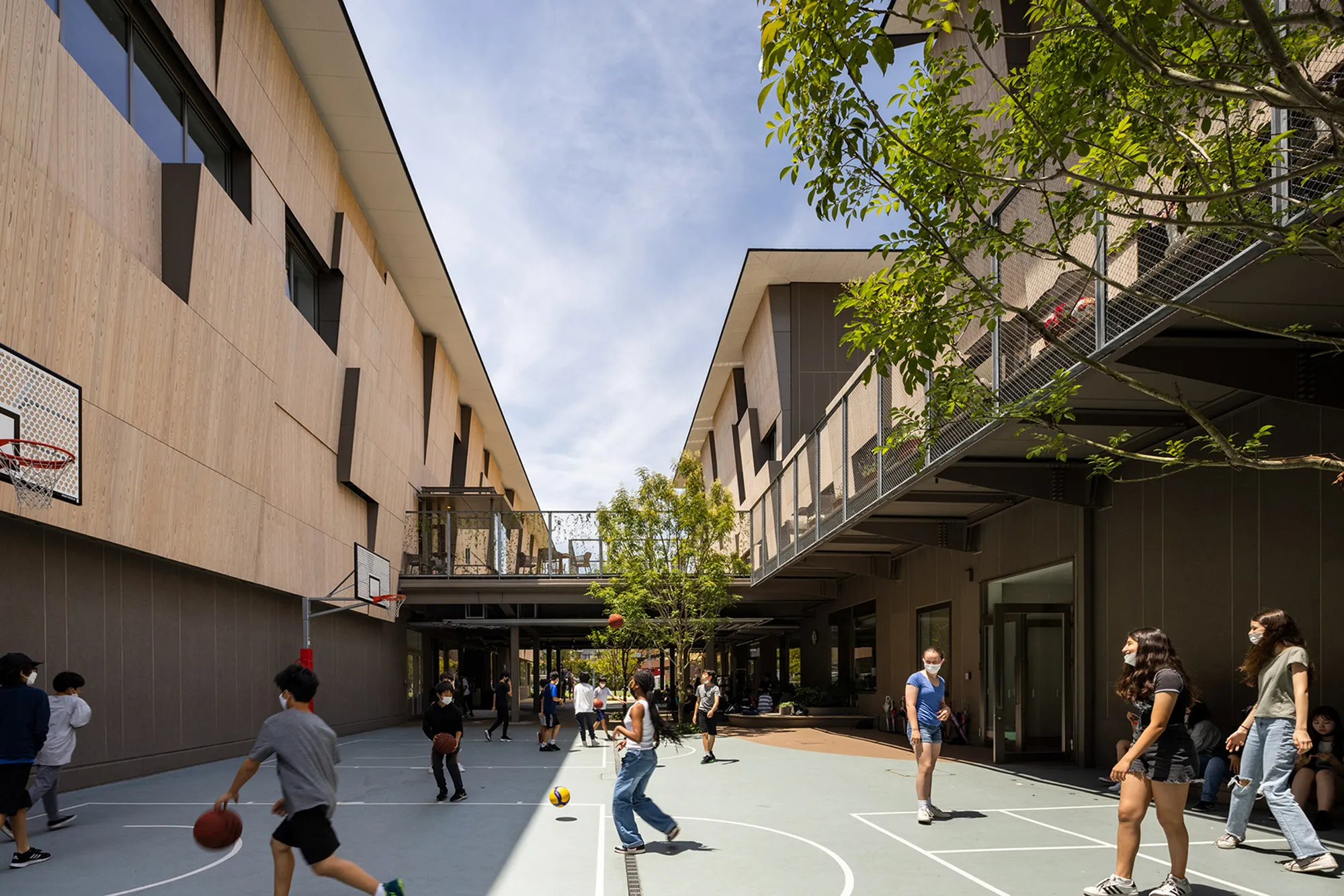 Kengo Kuma and TAISEI DESIGN Wrap a Yokohama School in Cedar to Make Every Space a Classroom