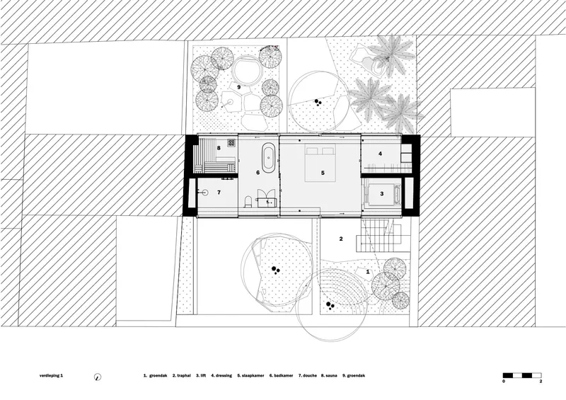 Floor plan drawing showing interior rooms and two courtyard gardens with circular paving patterns and trees