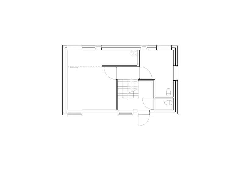 Upper floor plan drawing with central staircase and bathroom to the right