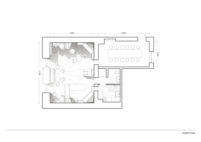 Floor plan drawing showing curved seating zones, conference room, and central stairwell