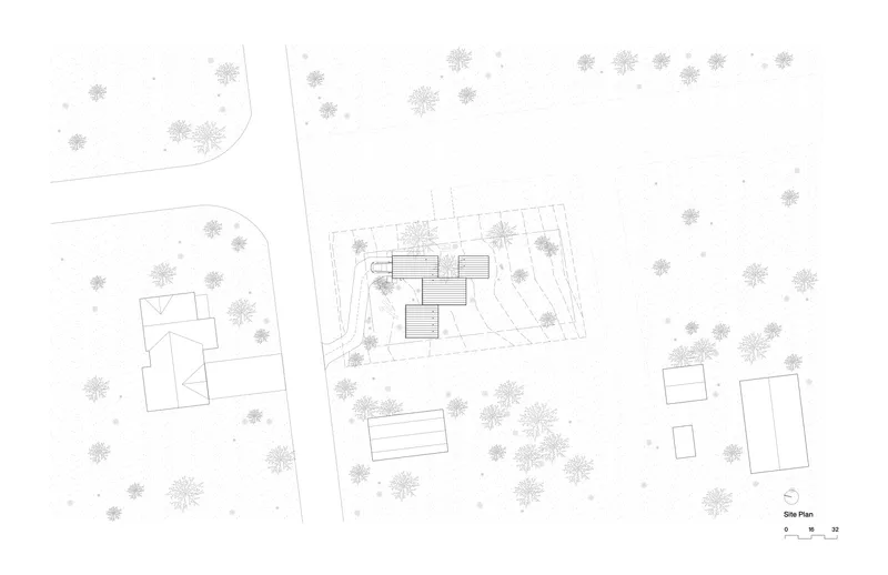 Site plan drawing showing a cluster of volumes among scattered trees and adjacent buildings
